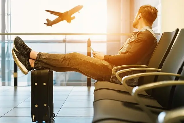 Guy sitting at Aiport waiting